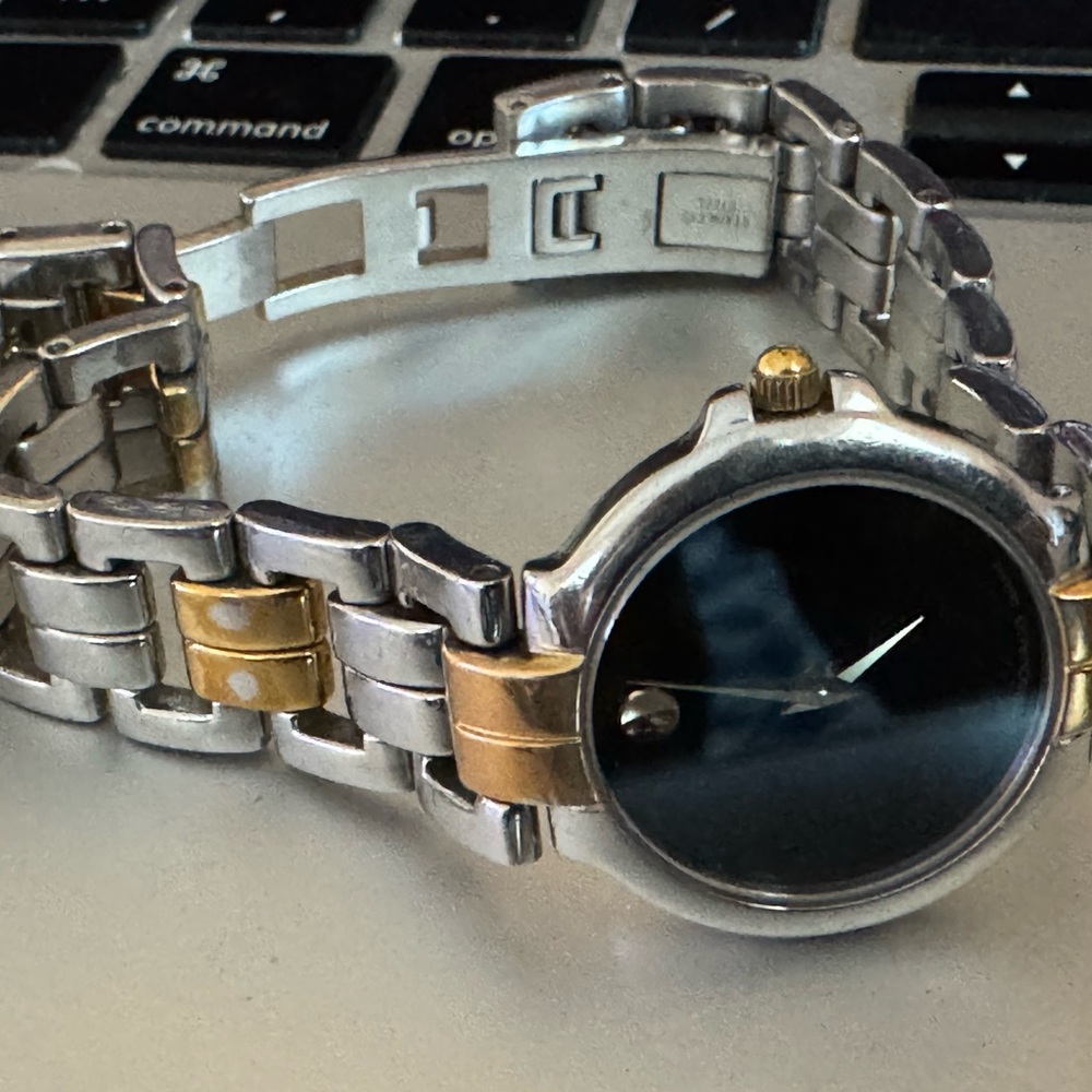 Silver and Gold Movado Watch with Black Dial